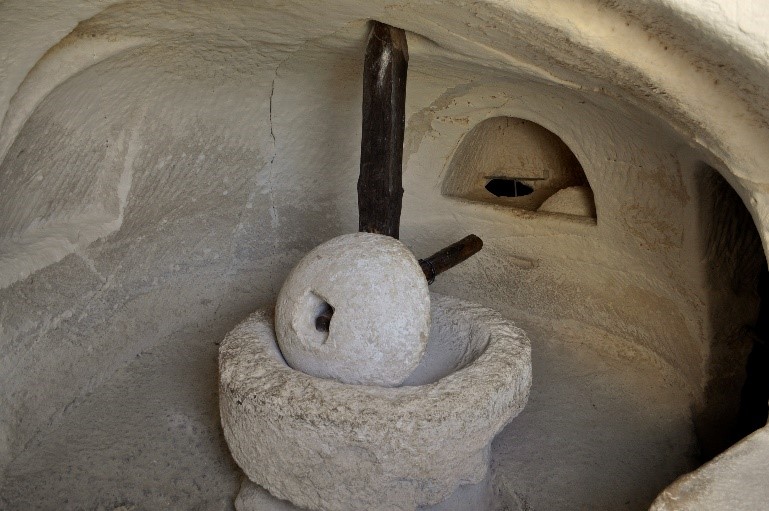 Example of an olive mill (left) and a press (right), Maresa (Israel). Photo: Henri Gourinard
