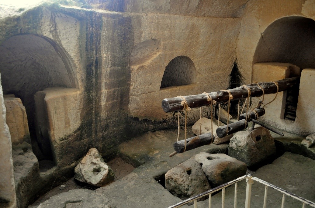 Example of an olive mill (left) and a press (right), Maresa (Israel). Photo: Henri Gourinard