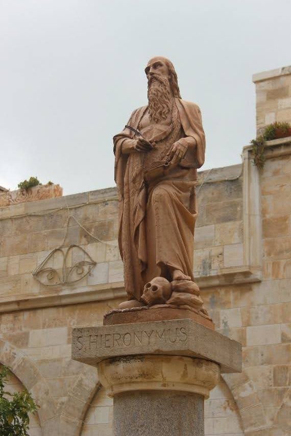 Statue of Saint Jerome, located in the courtyard of the Church of Saint Catherine in Bethlehem. Source: Wiki Commons.<br />

