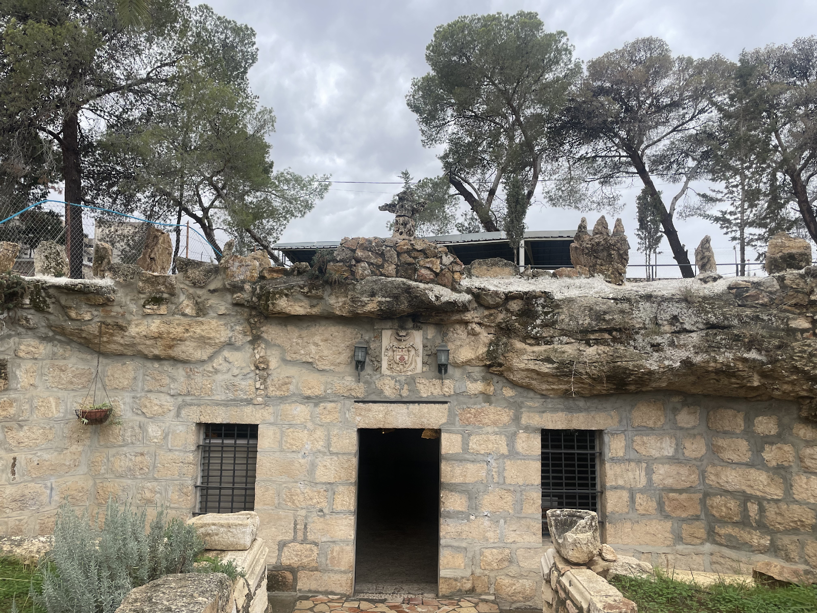 Entrance to one of the grottos, shepherds’ shelters transformed into a chapel. Photo: Henri Gourinard